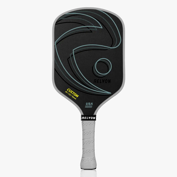 Black and gray pickleball paddle with 'Relyon' branding on a white background